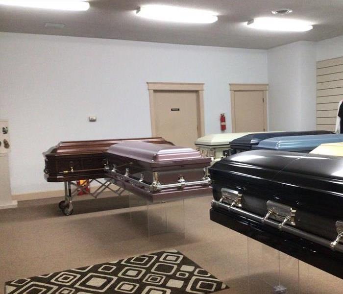 Casket room with clean ceilings and lights